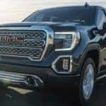 A 2021 GMC Sierra 1500 is shown driving on a highway after leaving a Murfreesboro GMC dealer.