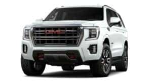 A white 2022 GMC Yukon AT4 is angled left.