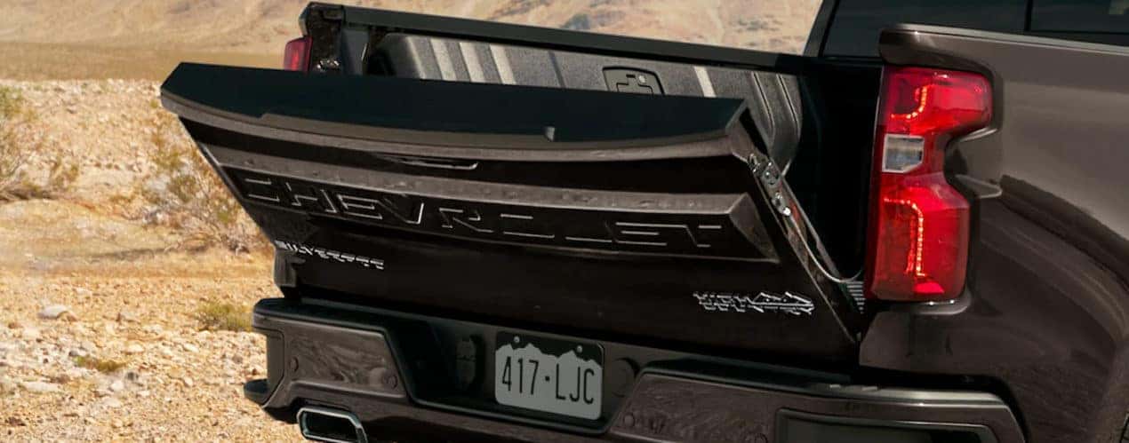 The liftgate is shown on a black 2022 Chevy Silverado 1500 High Country during a 2022 Chevy Silverado 1500 vs 2022 Ford F-150 comparison.