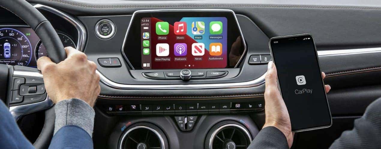 The black interior of a 2022 Chevy Blazer shows the infotainment screen.