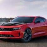 A red Certified Pre-Owned 2020 Chevy Camaro is shown from the front at an angle