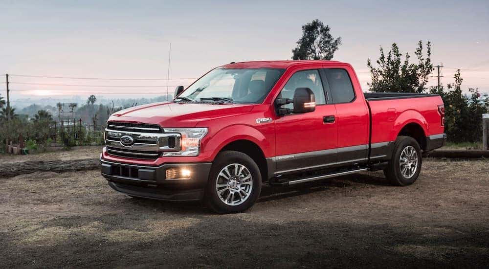 A red 2019 Ford F-150 is shown after leaving a Murfreesboro used truck dealer.
