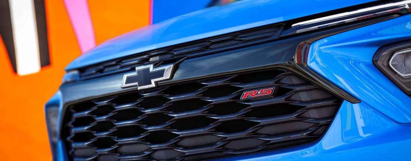 A close up shows the grille on a blue 2024 Chevy Trailblazer RS.
