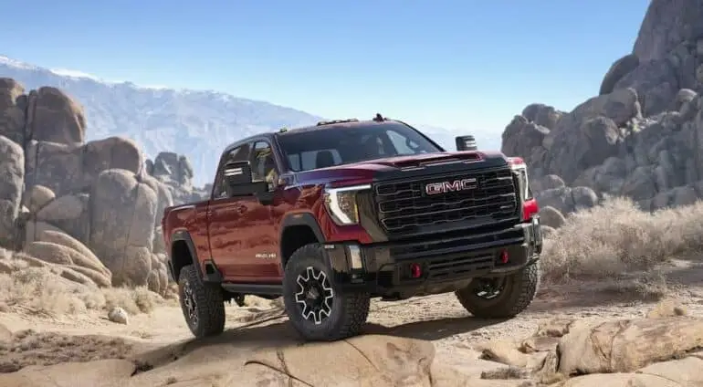 Should You Choose the 2024 Sierra 2500 HD Denali or AT4? | Newton ...