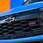 A close up of the grille on a blue 2024 Chevy Trailblazer RS is shown.