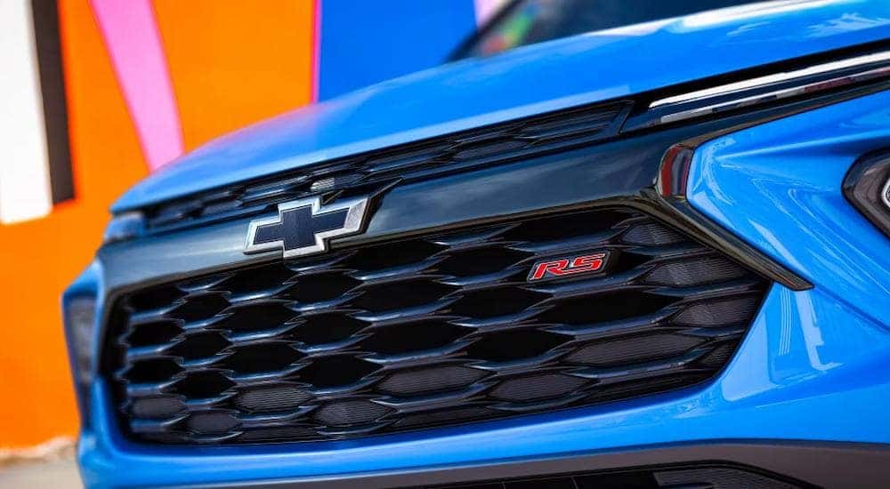 A close up of the grille on a blue 2024 Chevy Trailblazer RS is shown.