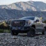 A grey 2024 GMC Sierra 1500 AT4x AEV is shown from the front at an angle after leaving a Lewisburg, TN GMC dealer.