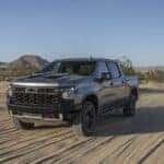 A grey 2024 Chevy Silverado 1500 ZR2 is shown from the front at an angle.