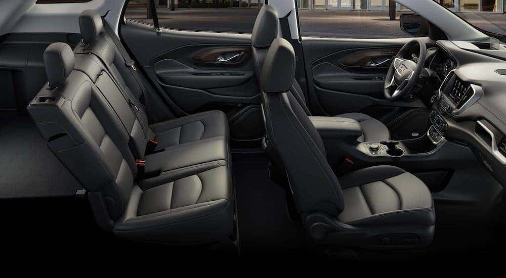 The black interior of a 2023 GMC Terrain SLT is shown.