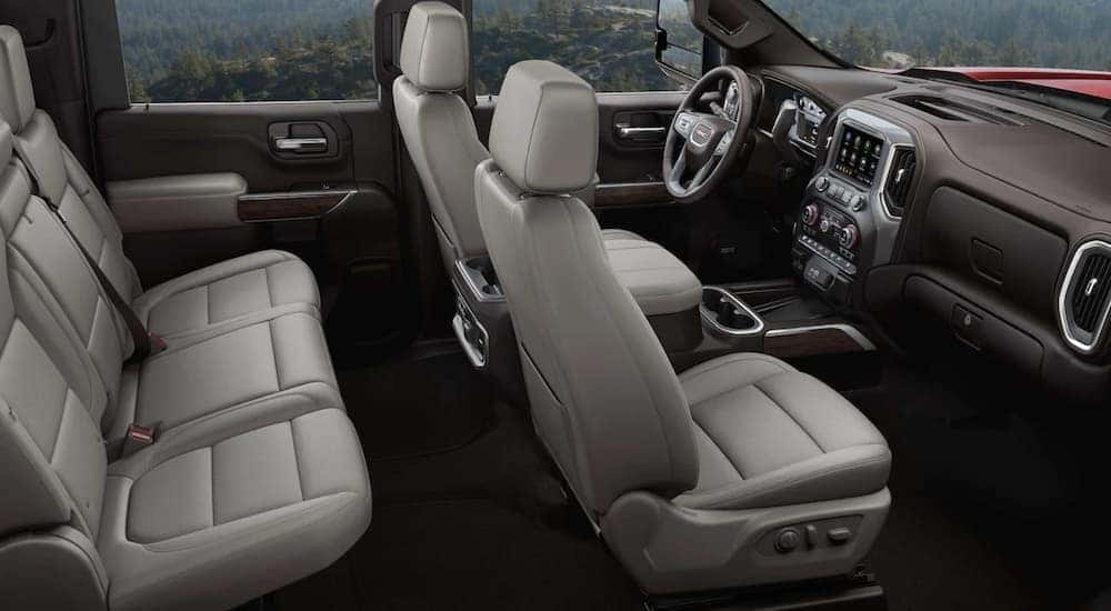 The grey interior of a 2024 GMC Sierra 3500 HD is shown.