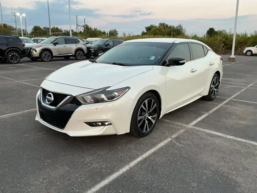 white nissan pre-auction high mileage used car for sale at newton chevy gmc in shelbyville