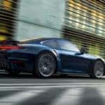 2021 Porsche 911 Turbo driving down road