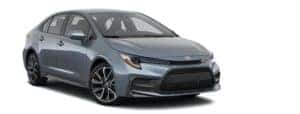 A pale blue 2021 Toyota Corolla is angled right.