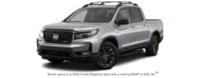A silver 2022 Honda Ridgeline Sport is shown angled left.