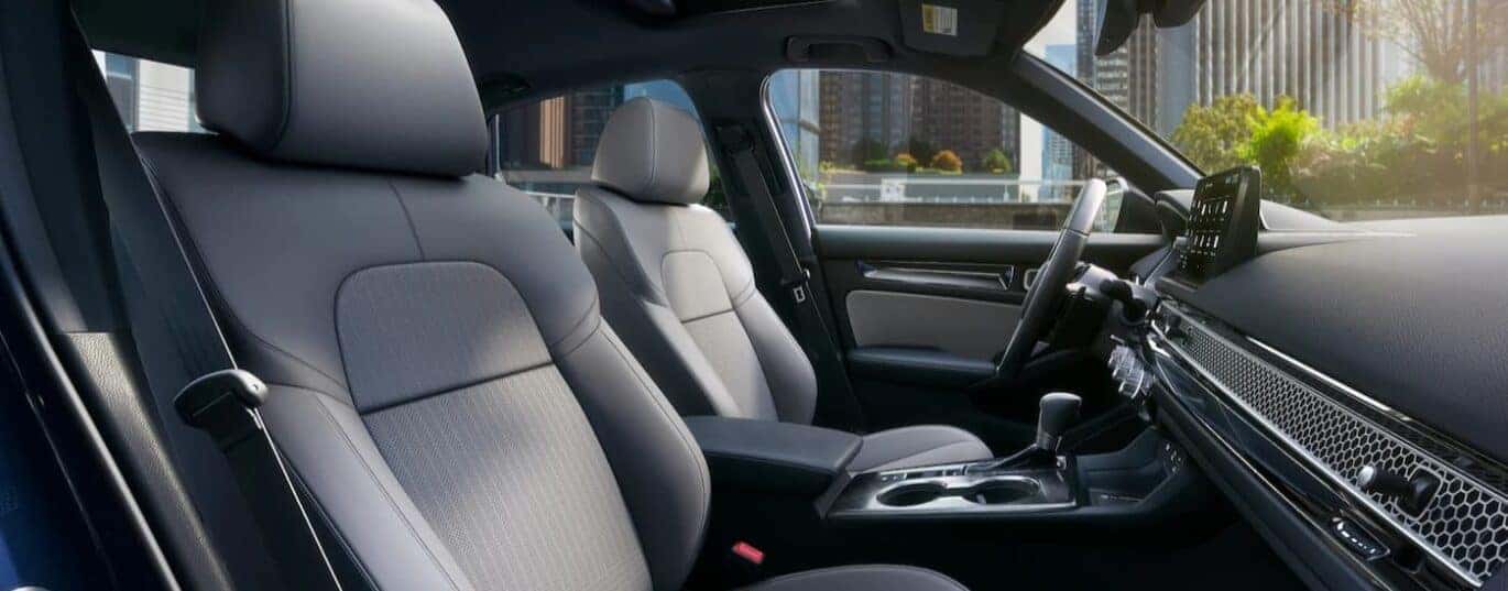 The gray interior and dash is shown in a 2025 Honda Civic.