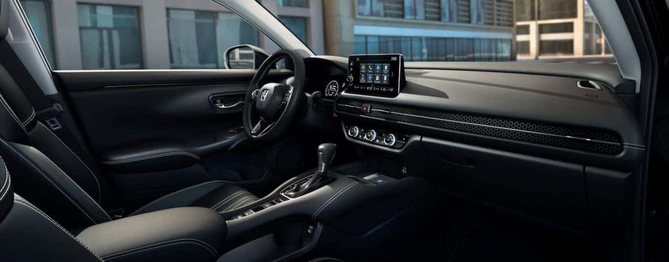 The black interior and dash are shown in a 2025 Honda HR-V.
