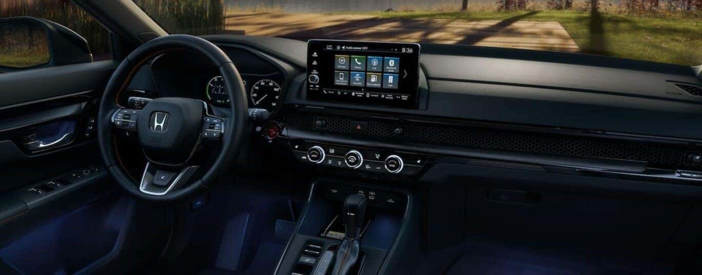 The black dash is shown in a 2025 Honda CR-V Sport Touring Hybrid.