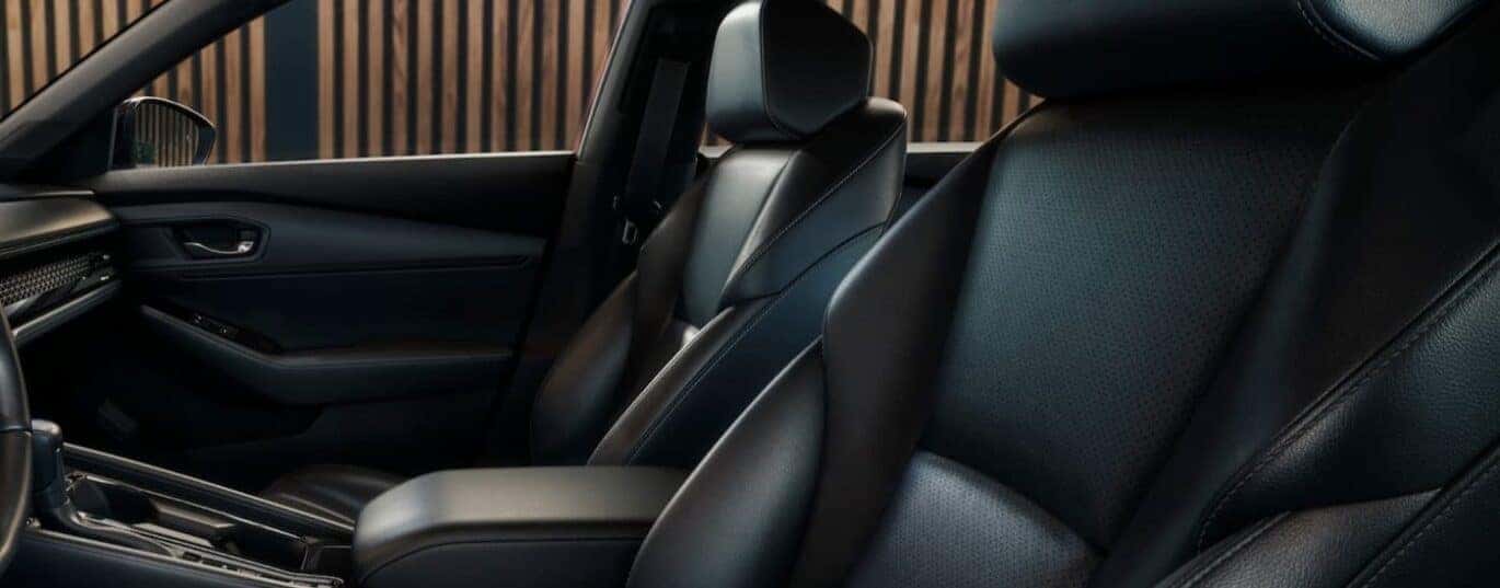 The black interior is shown in a 2025 Honda Accord Hybrid.