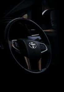 black and silver car steering wheel