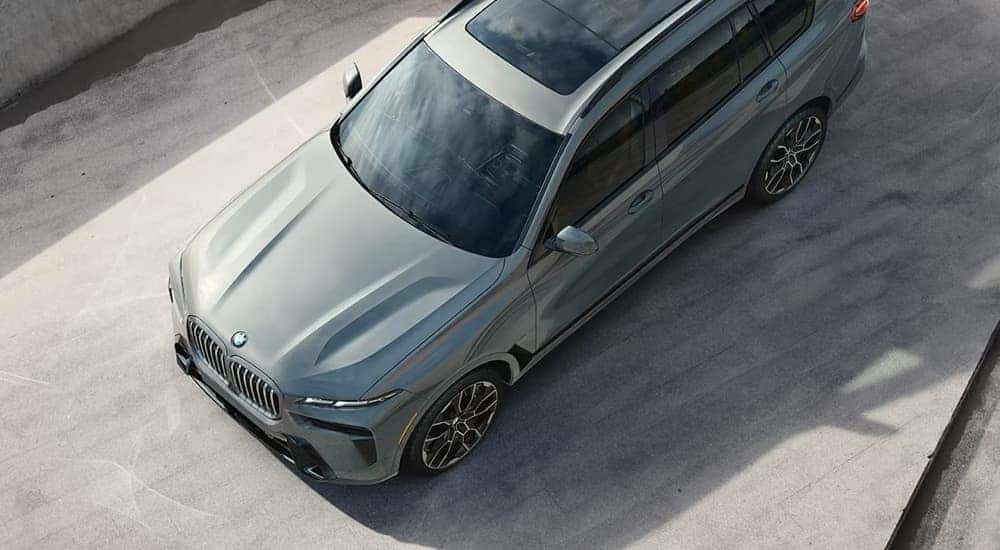 Overhead view of a grey 2025 BMW X7 with panoramic moonroof.