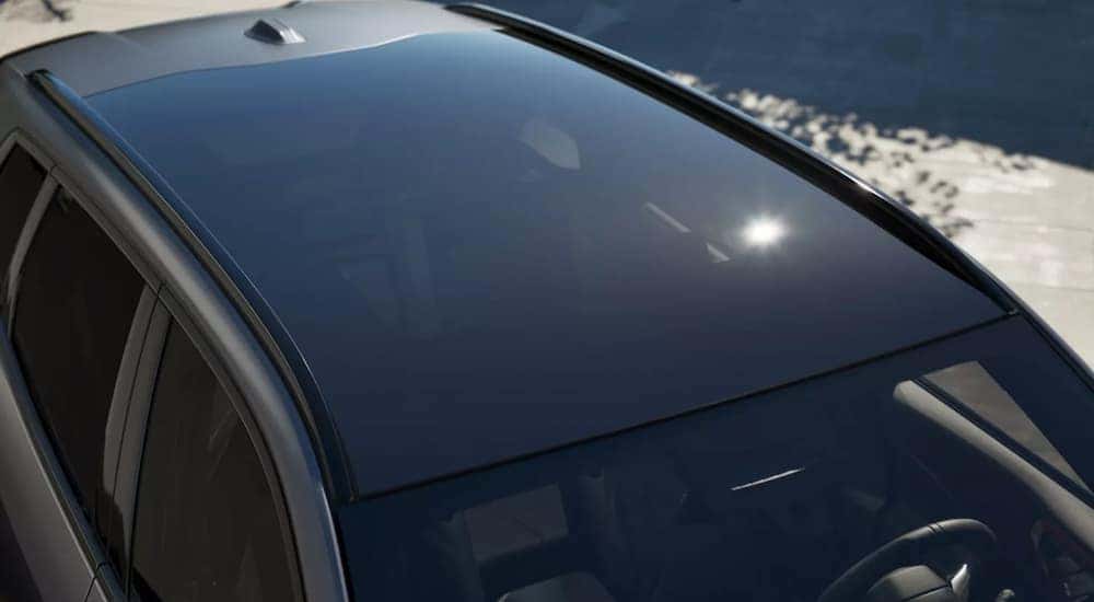 The sun roof of a 2025 BMW X3 parked at a dealer.