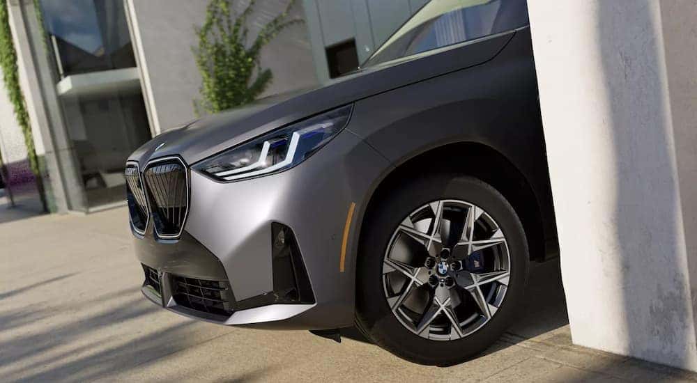 A side front view of a grey 2025 BMW X3.