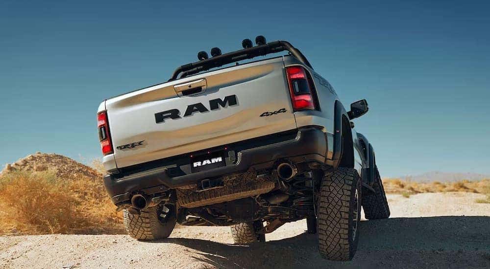 A silver 2023 Ram 1500 TRX from the rear.