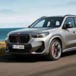 A silver 2025 BMW X1 M35i from the front at an angle.