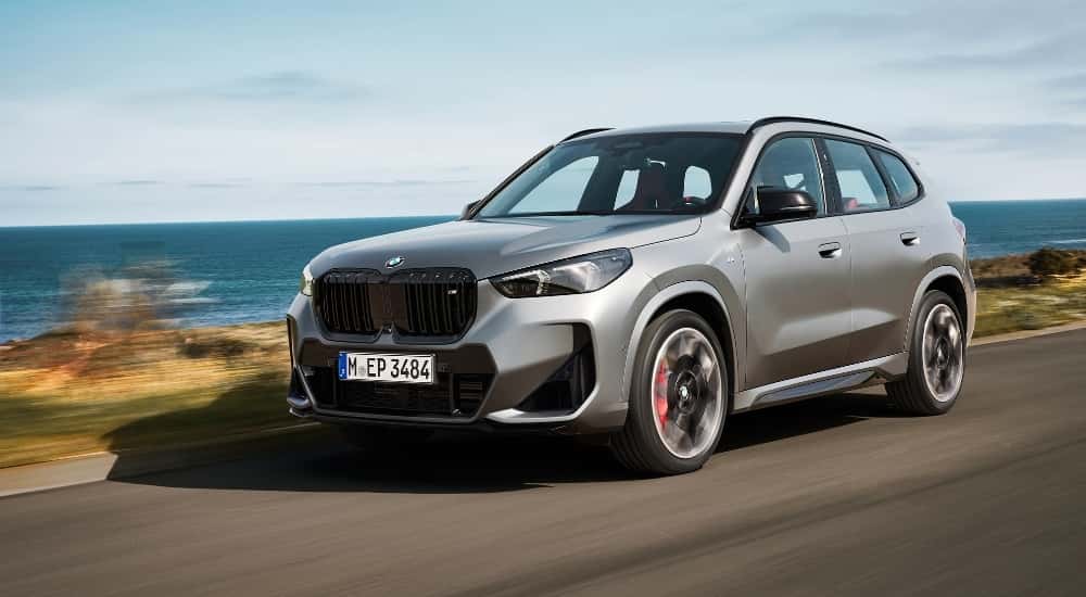 A silver 2025 BMW X1 M35i from the front at an angle.