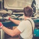 A technician is shown doing an auto alignment near you.