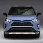 A blue 2023 Toyota RAV4 for sale, is shown parked at Romeoville Toyota.