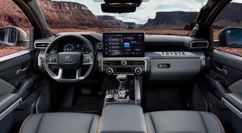 The interior of a 2024 Toyota Tacoma is shown from above the center console.