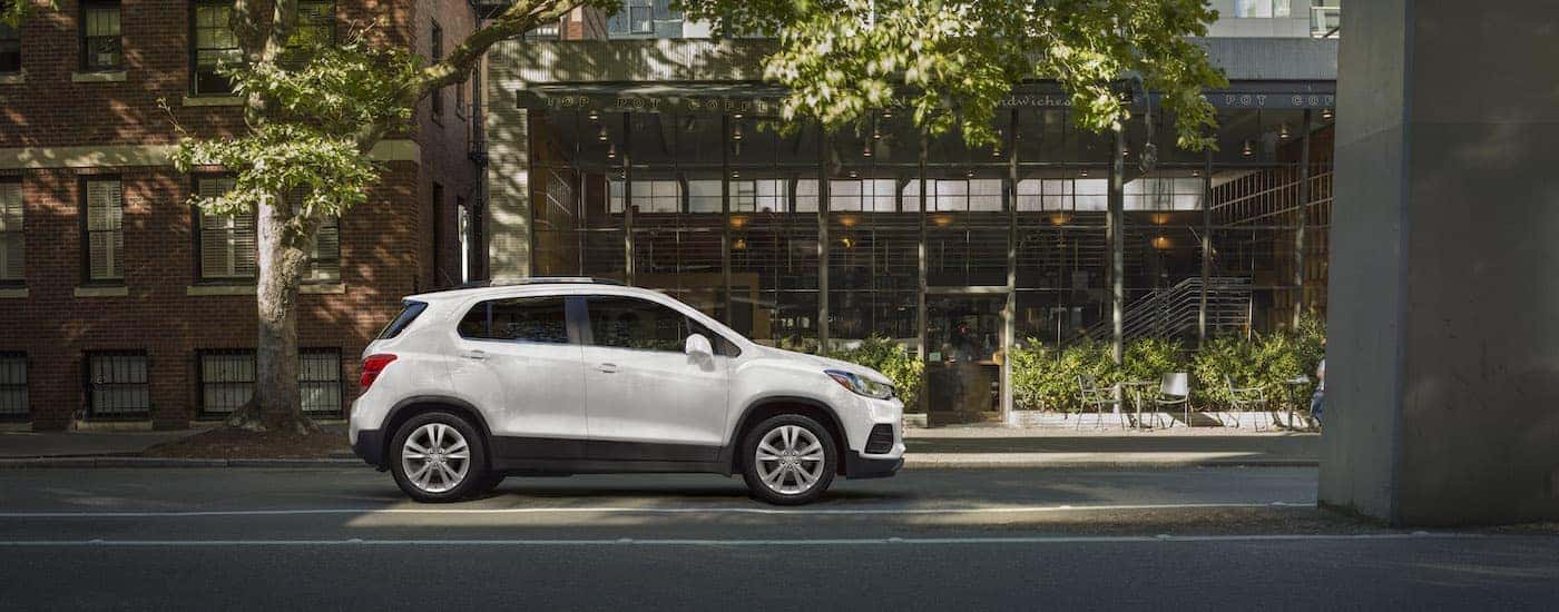 A white 2019 Chevy Trax for sale is shown from the side.