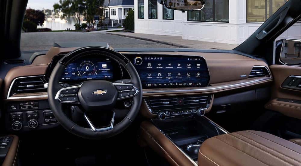 A brown 2025 Chevy Suburban High Country is shown from the driver's seat after leaving a Chevy dealer near Jacksboro.