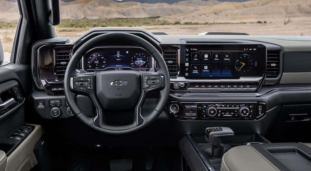The interior of a 2025 Chevy Silverado 1500 is shown.
