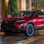 A red 2025 Chevy Blazer RS is shown from the front at an angle.