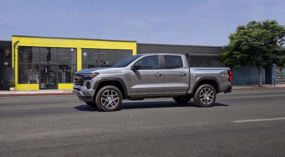 A silver 2024 Chevy Colorado from the side.