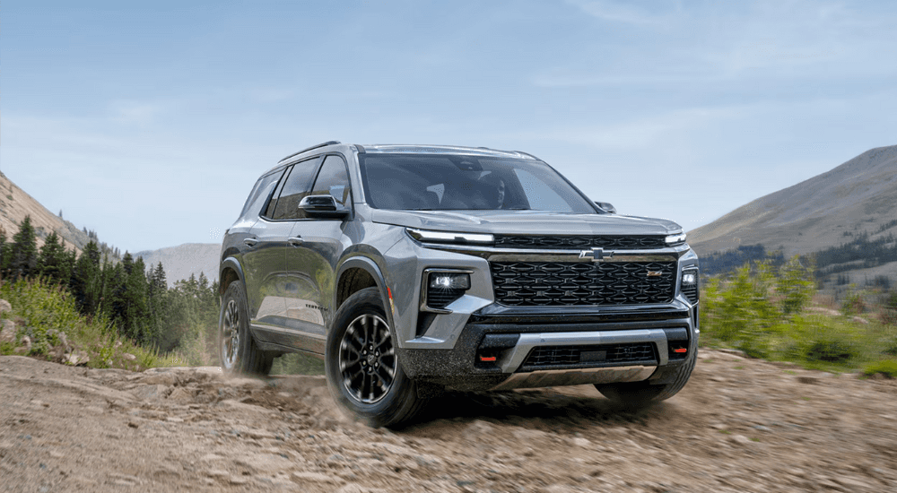 Silver 2026 Chevy Traverse Z71 driving on a trail