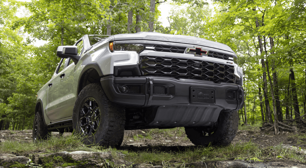 White 2026 Chevy Silverado 1500 ZR2 Bison Edition driving off-road