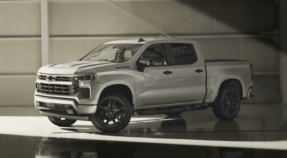 Silver 2026 Chevy Silverado 1500 Redline for sale near Powell parked in a garage