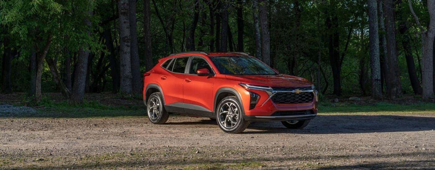 Red 2024 Chevy Trax LT parked off-road