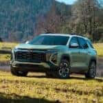 Green 2026 Chevy Equinox parked on grass