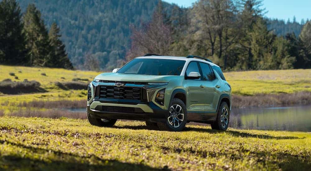 Green 2026 Chevy Equinox parked on grass