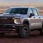 A white 2027 Chevy SIlverado 1500 parked off-road.