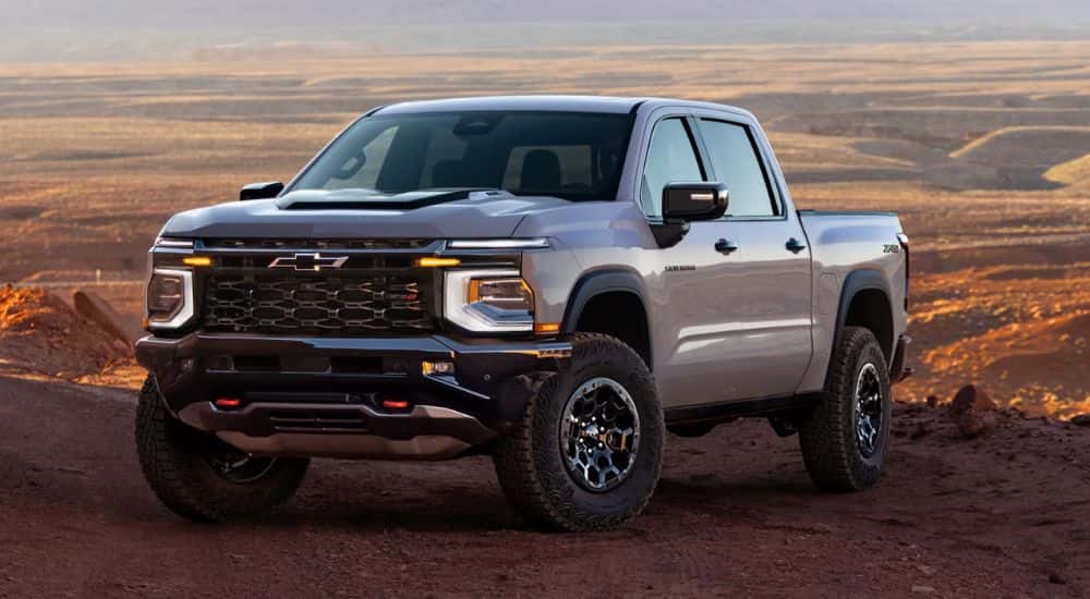 A white 2027 Chevy Silverado 1500 parked off-road.