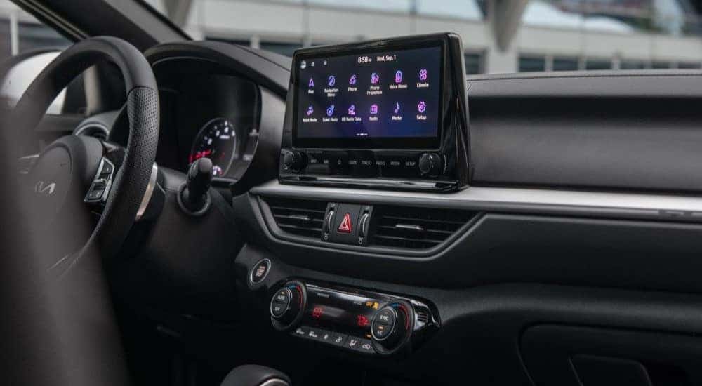 The black dash in a 2023 Kia Forte is shown.