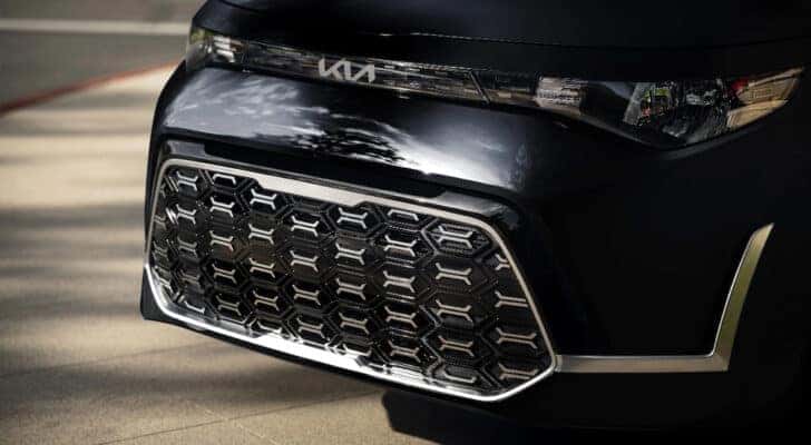 A close-up of the grille on a black 2024 Kia Soul for sale.