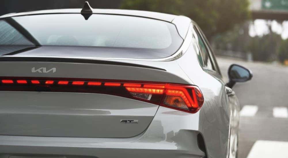 Close-up on the taillight of a grey 2024 Kia K5 GT-Line.