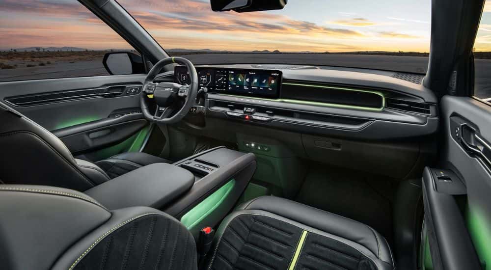 Green ambient lighting in the cabin of a 2026 Kia EV9 GT.