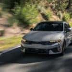 A grey 2025 Kia K5 for sale from the front.